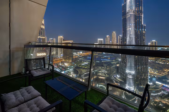 Burj Vista: The balcony at dusk, the Burj Khalifa and the fountain lake straight ahead