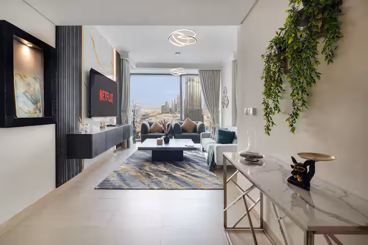 Burj Vista: The living room from the hall, the dining table beyond