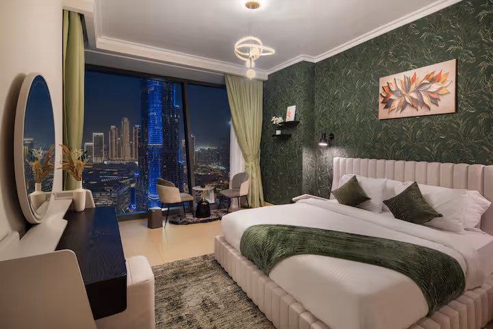 Burj Vista: Bedroom three, green walls, the Burj Khalifa in the window