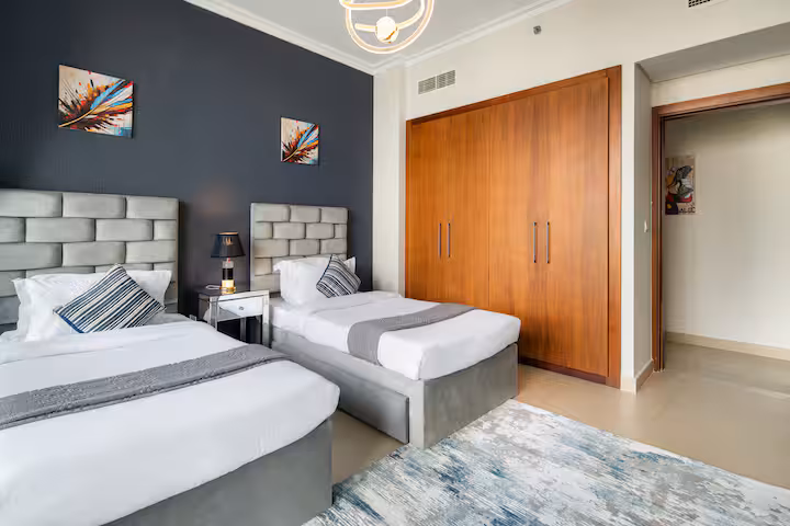 Burj Vista: Bedroom four, the timber wardrobe