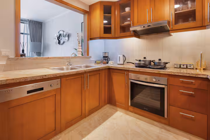 The Links East: The kitchen: timber units, hob and oven