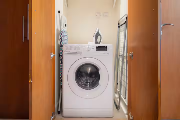 The Links East: The washing machine in its cupboard