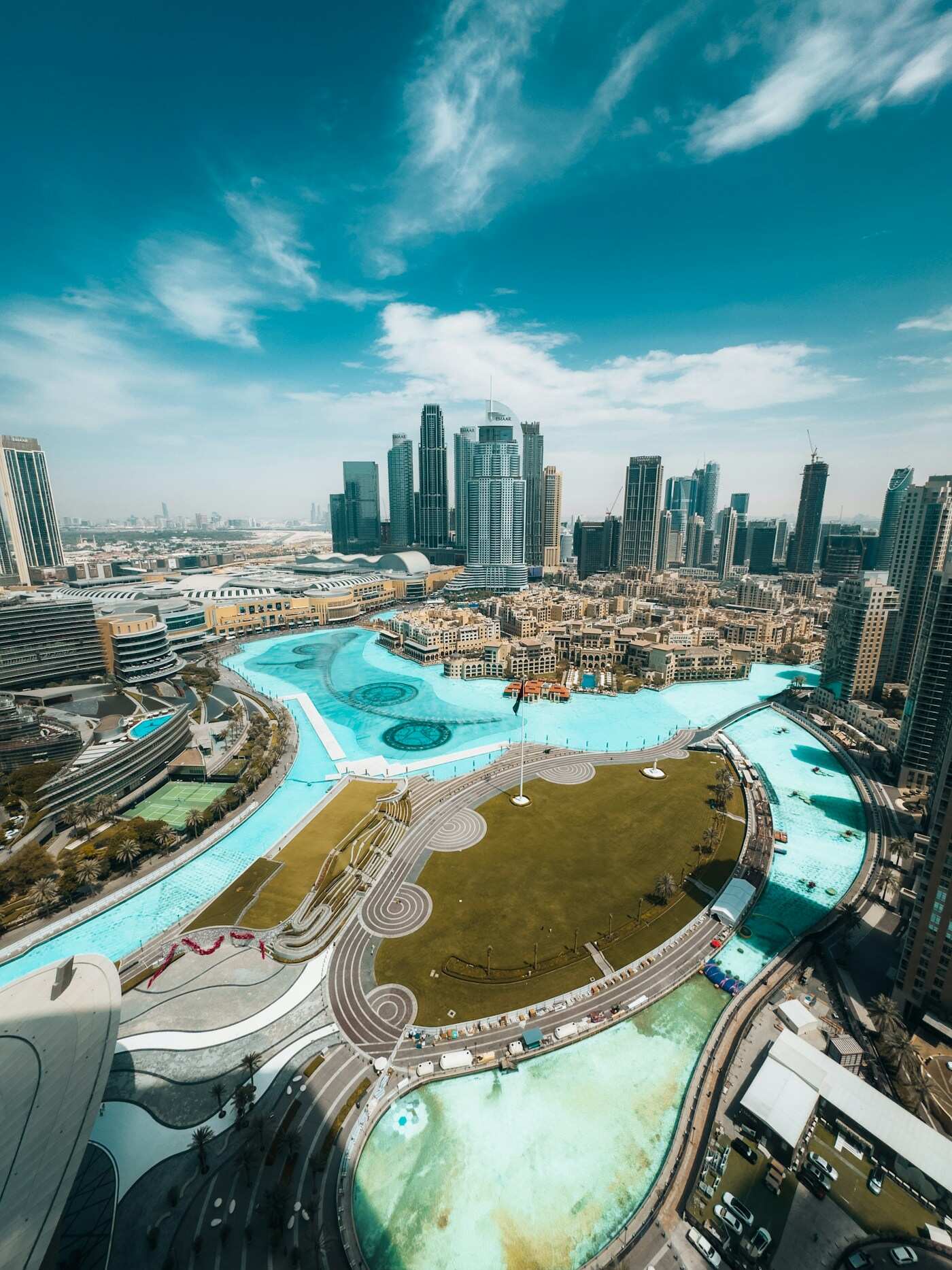 Downtown Dubai from above: the lake, the low roofs of the Old Town and the towers beyond