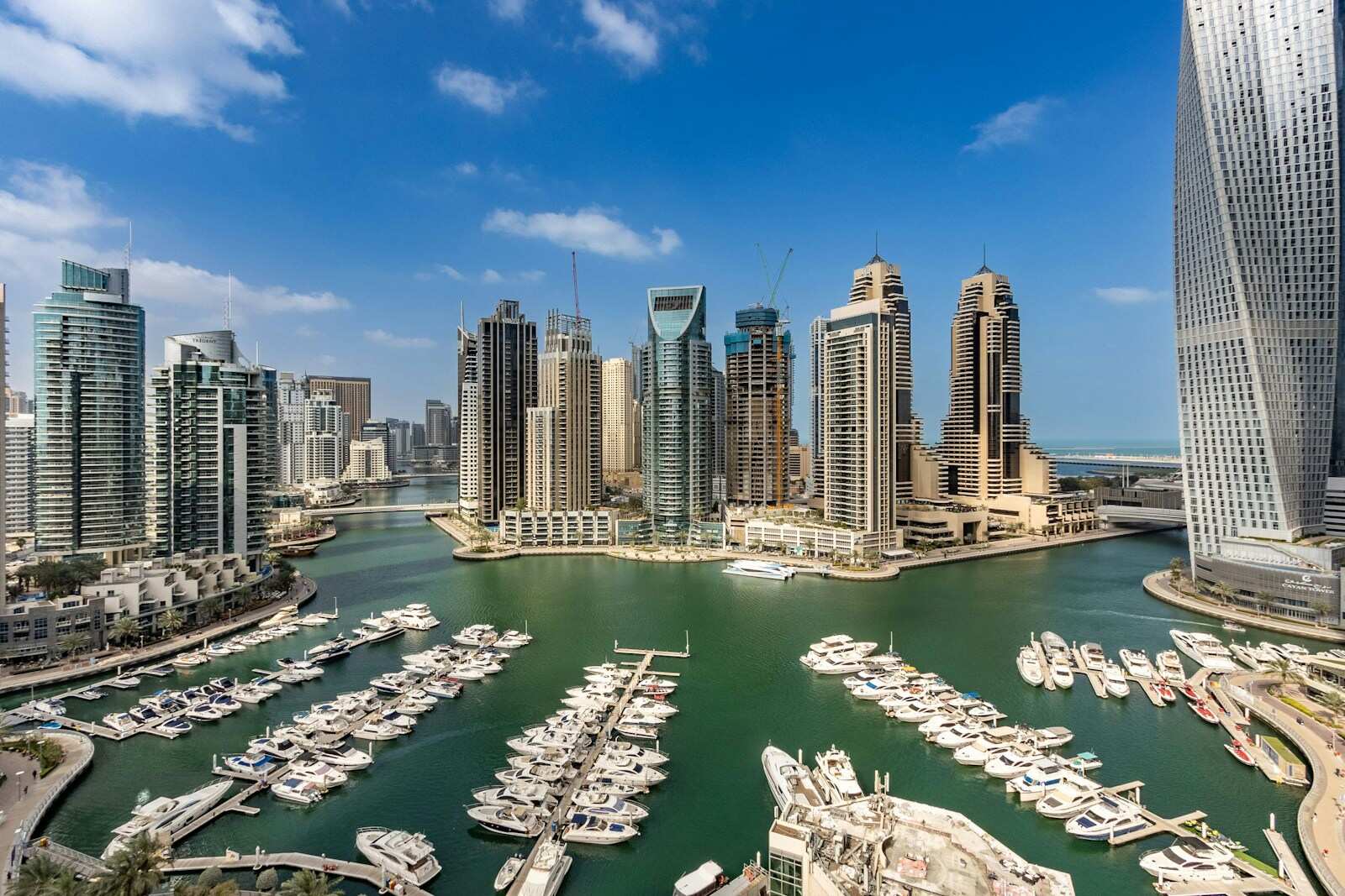 Dubai Marina from above, the towers around the water and the yachts below
