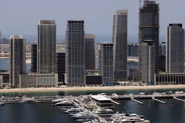 Dubai Marina from Sulafa Tower: the Marina towers and the water at the end of the day