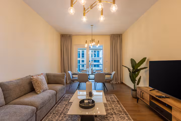 Sulafa Tower: The sofa, the television and the balcony door